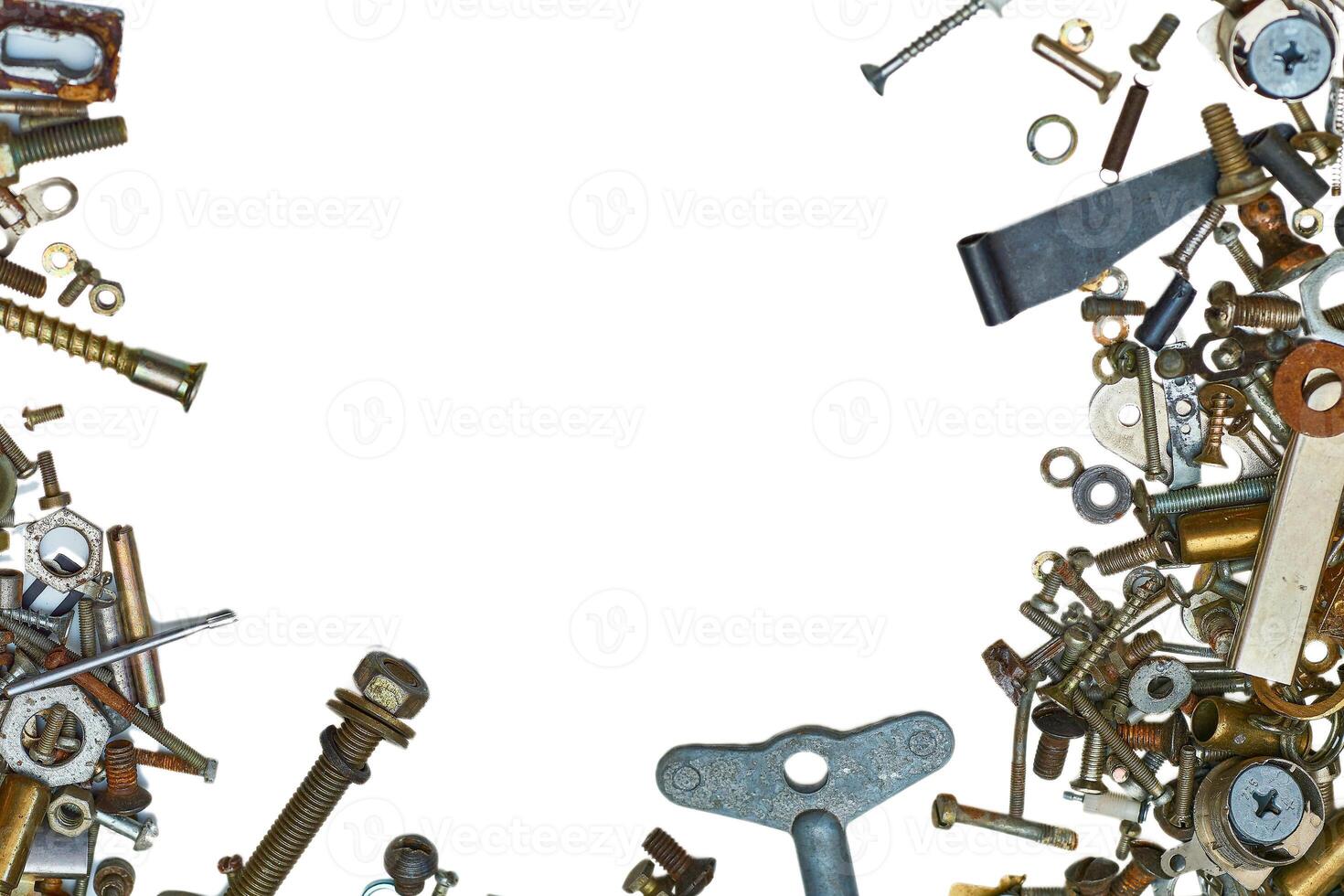 Metal sundries,mess.Various iron bolts, nuts, washers, fasteners scattered photo