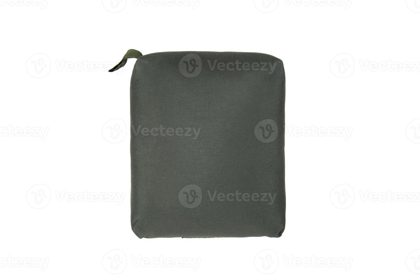 A green tactical barricade bag is isolated on a white. The bag is designed to provide a stable rest for firearms when shooting from elevated or uneven surfaces. photo
