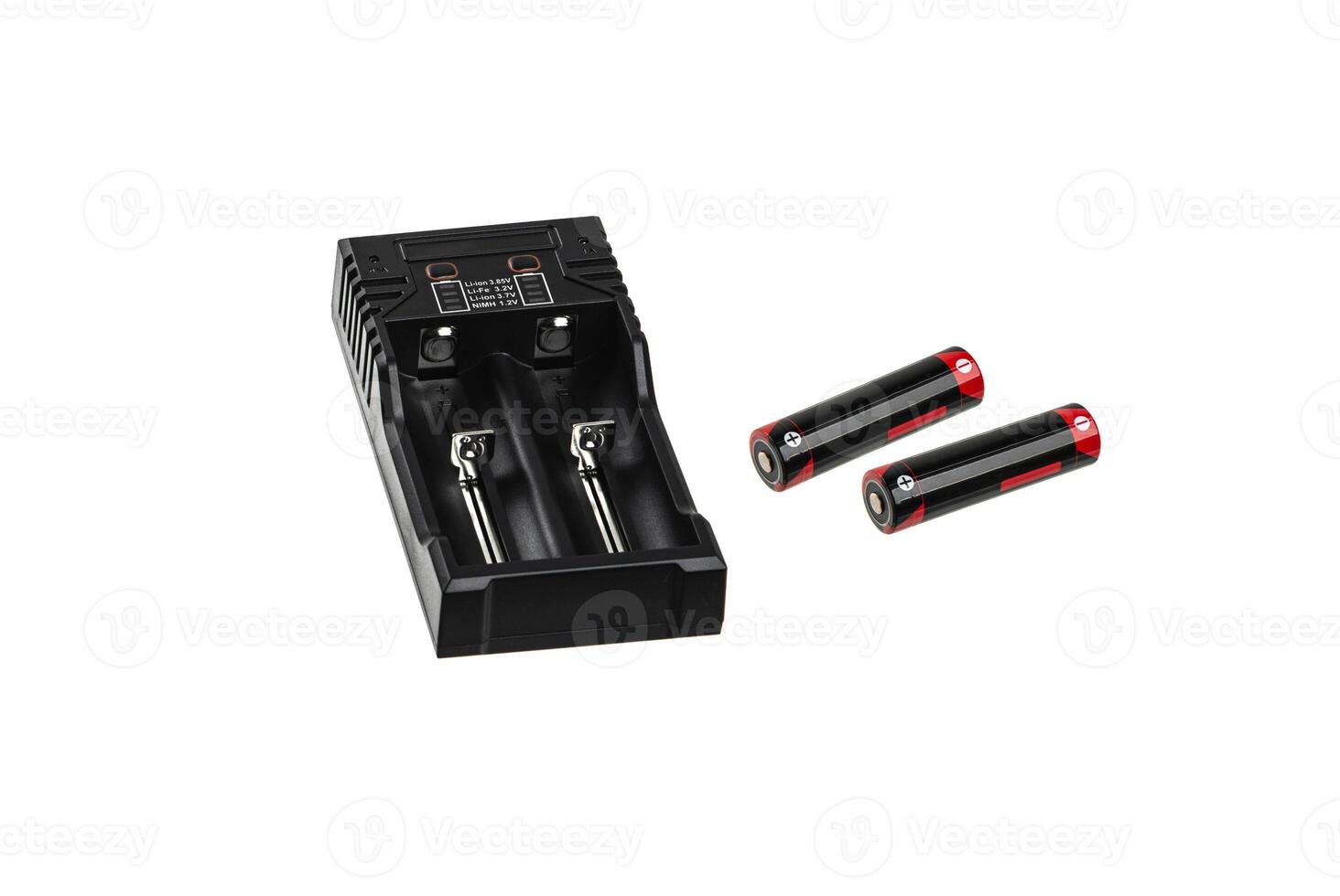 A black, dual-slot battery charger with two red and black 18650 rechargeable batteries. The charger features a sleek, modern design and is isolated on a white photo