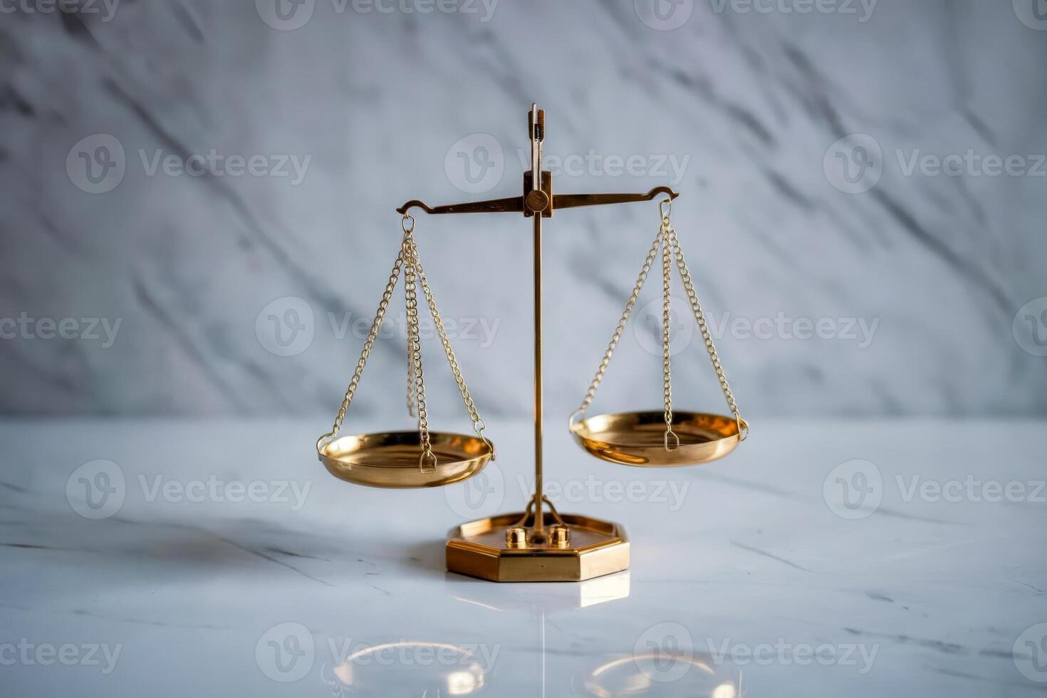 Gold balance scale on a marble surface, symbolizing justice and balance. photo