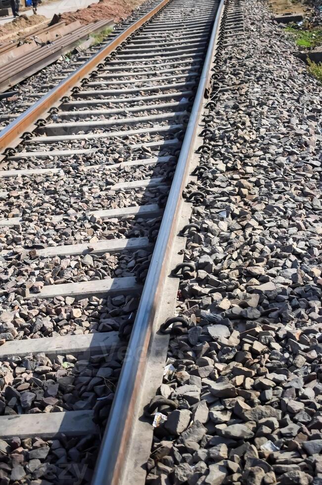 View of train Railway Tracks from the middle during daytime at Amritsar railway station in India, Train railway track view, Indian Railway junction, Heavy industry photo
