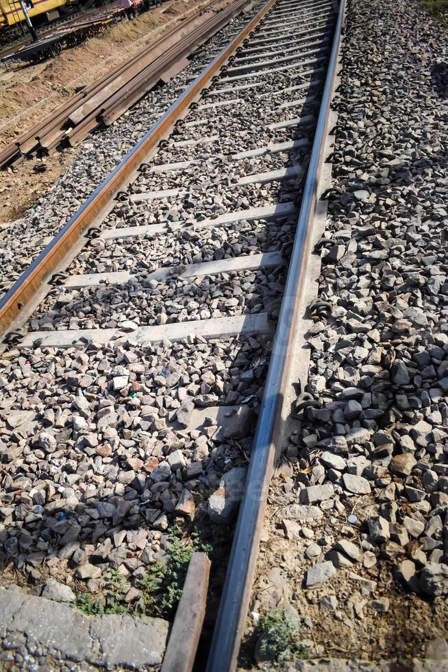 View of train Railway Tracks from the middle during daytime at Amritsar railway station in India, Train railway track view, Indian Railway junction, Heavy industry photo