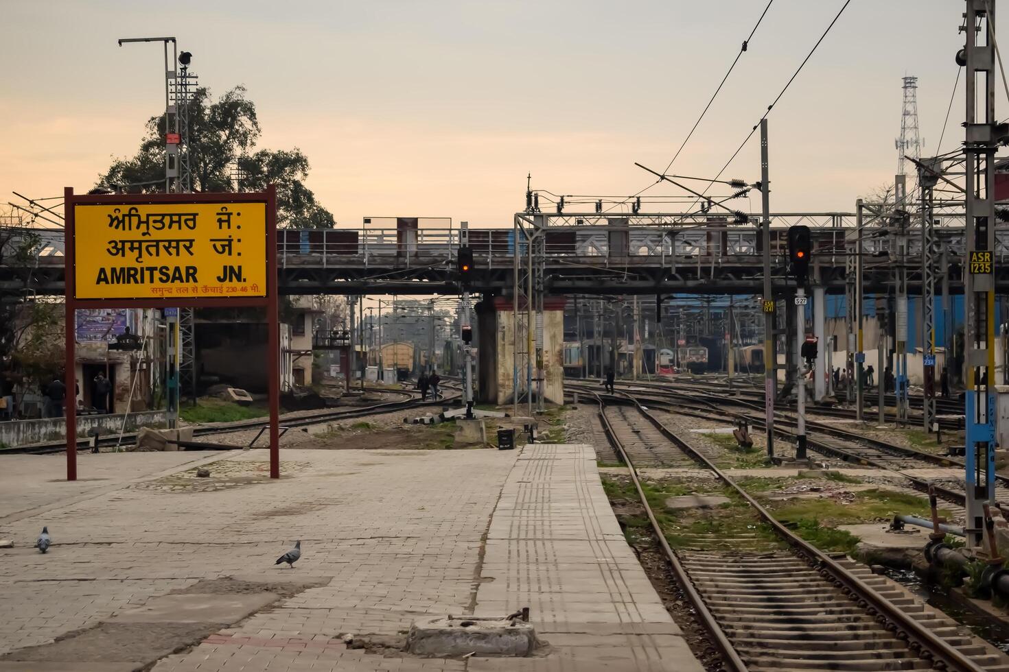 Amritsar, India, June 03 2024 - Amritsar railway station platform during morning time, Amritsar Railway station banner at Amritsar, Punjab railway station photo
