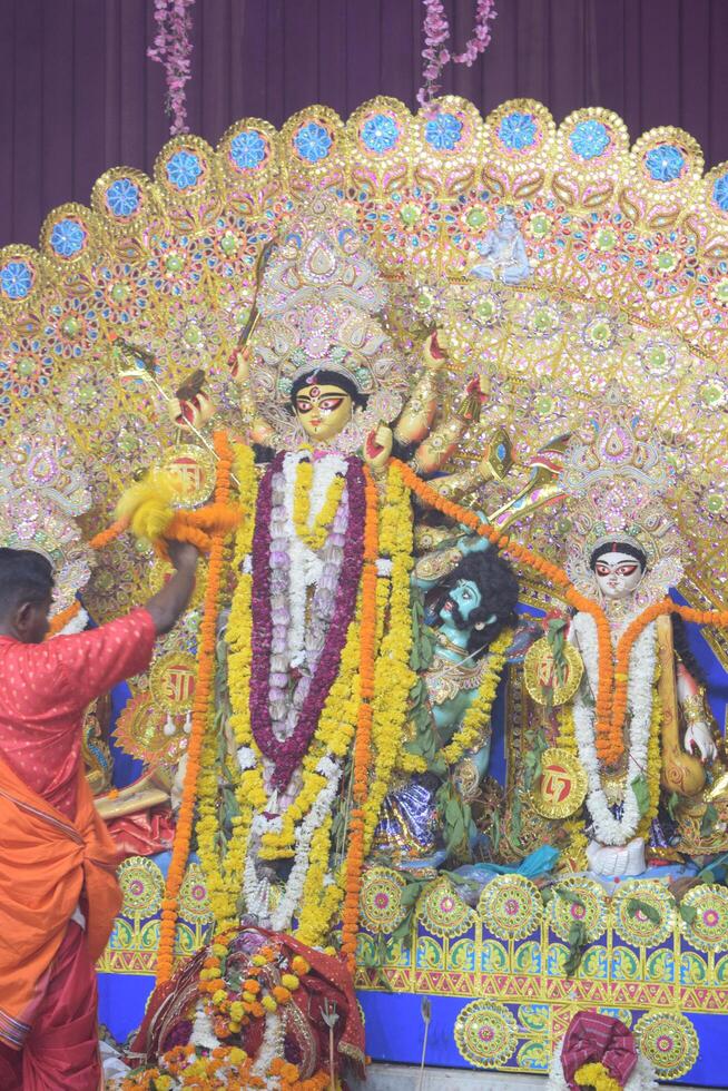 Delhi, India, October 02,2023 - Goddess Durga with traditional look in close up view in Jhilmil Colony Delhi, Durga Puja Idol, A biggest Hindu festival in India photo
