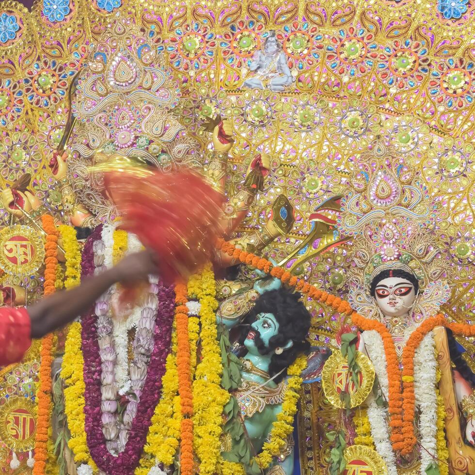 Delhi, India, October 02,2023 - Goddess Durga with traditional look in close up view in Jhilmil Colony Delhi, Durga Puja Idol, A biggest Hindu festival in India photo