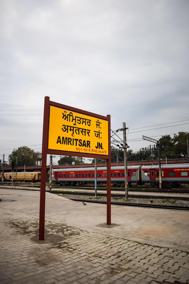 Amritsar, India, June 03 2024 - Amritsar railway station platform during morning time, Amritsar Railway station banner at Amritsar, Punjab railway station photo