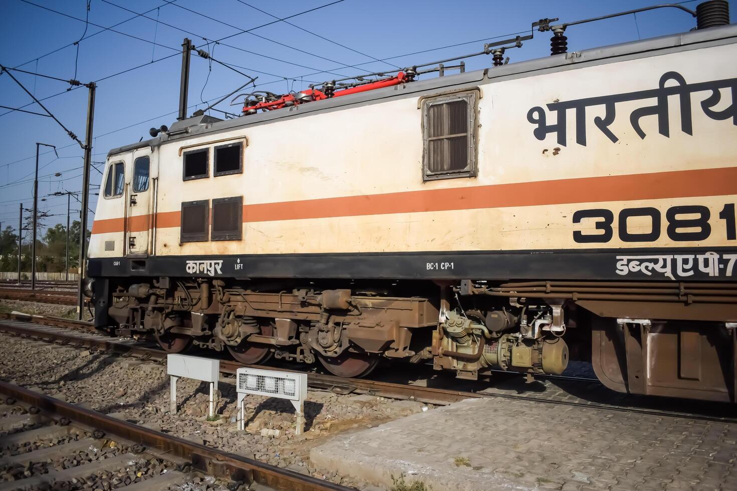 Delhi, India, June 09 2024 - Indian train electric locomotive engine at Anand Vihar railway station during the day time, Express train electrical locomotive engine photo
