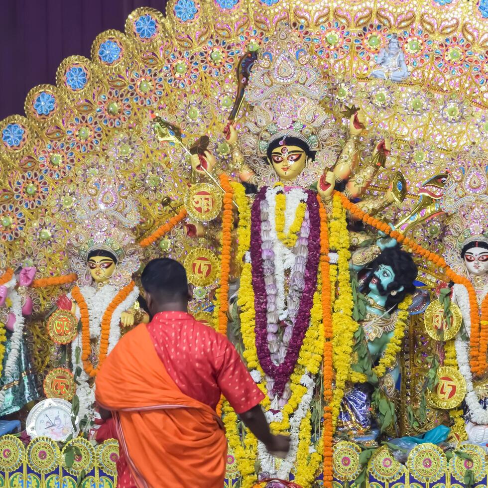 Delhi, India, October 02,2023 - Goddess Durga with traditional look in close up view in Jhilmil Colony Delhi, Durga Puja Idol, A biggest Hindu festival in India photo
