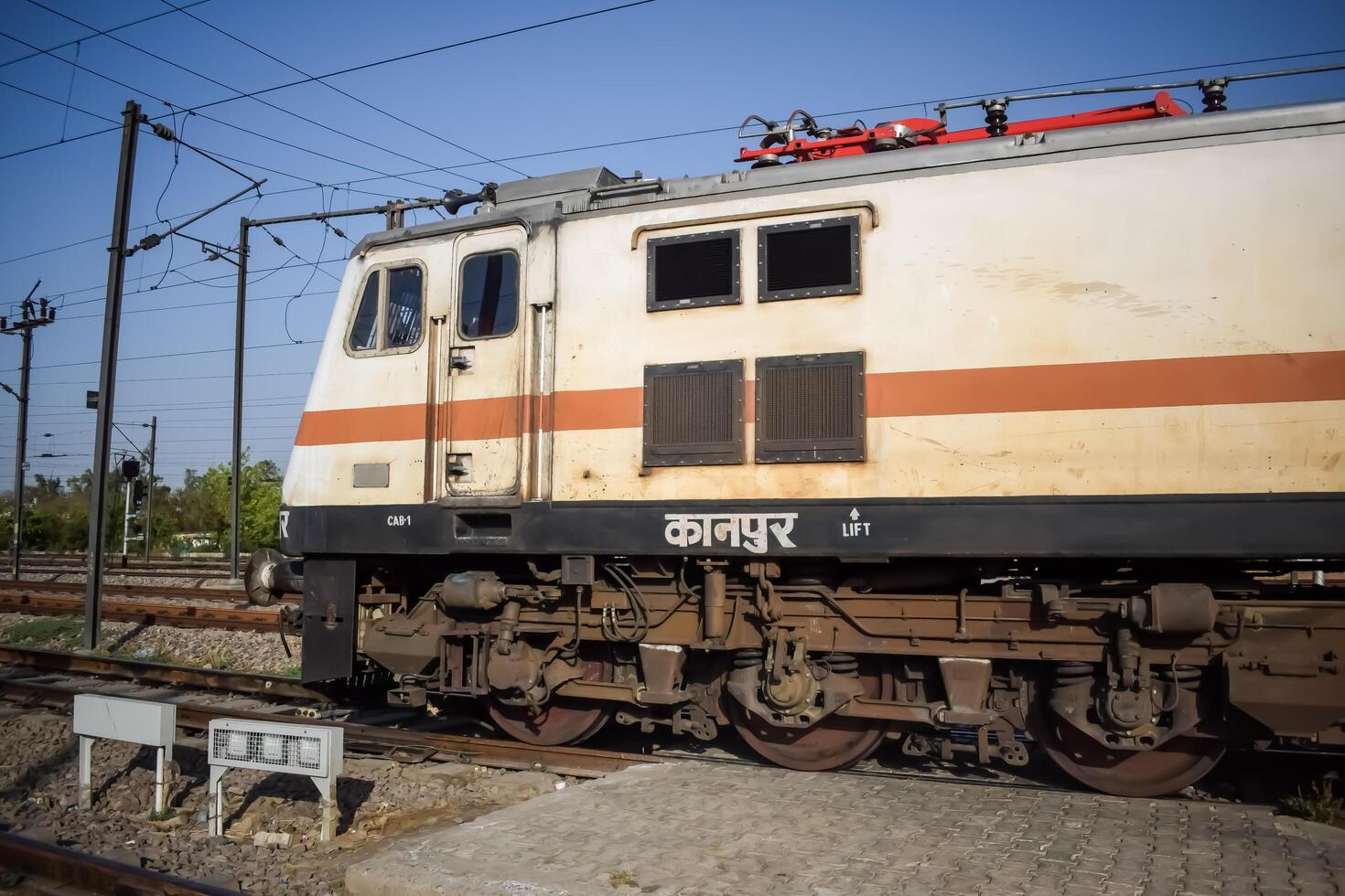 Delhi, India, June 09 2024 - Indian train electric locomotive engine at Anand Vihar railway station during the day time, Express train electrical locomotive engine photo