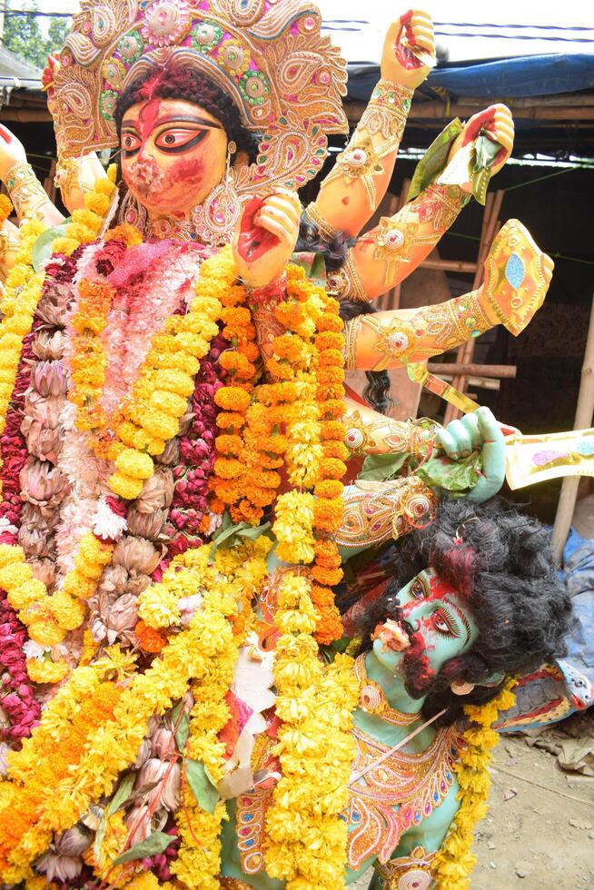 Delhi, India, October 02,2023 - Goddess Durga with traditional look in close up view in Jhilmil Colony Delhi, Durga Puja Idol, A biggest Hindu festival in India photo