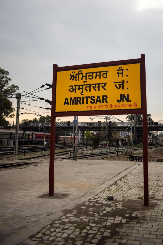 Amritsar, India, June 03 2024 - Amritsar railway station platform during morning time, Amritsar Railway station banner at Amritsar, Punjab railway station photo