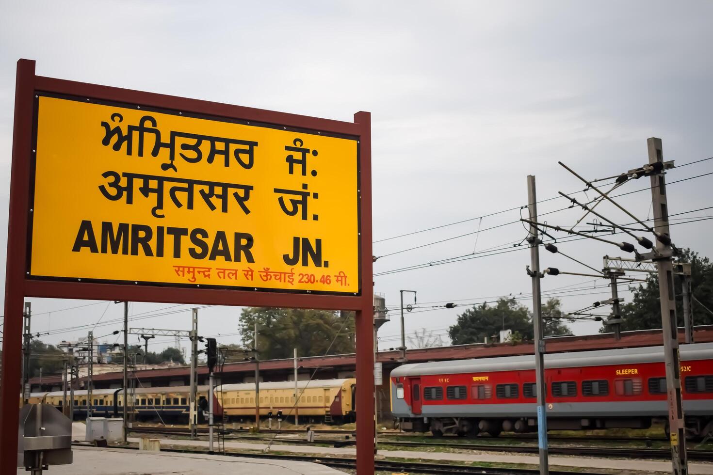 Amritsar, India, June 03 2024 - Amritsar railway station platform during morning time, Amritsar Railway station banner at Amritsar, Punjab railway station photo