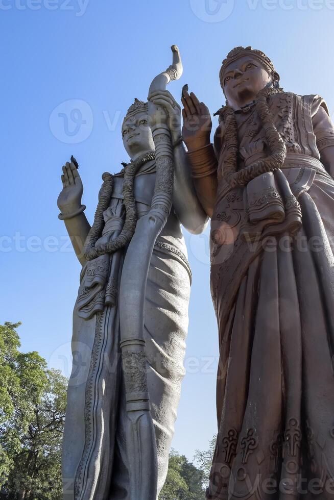 Big statue of Lord Sita Ram near Delhi International airport, Delhi, India, Lord Ram and Sita big statue touching sky at main highway Mahipalpur, Delhi photo