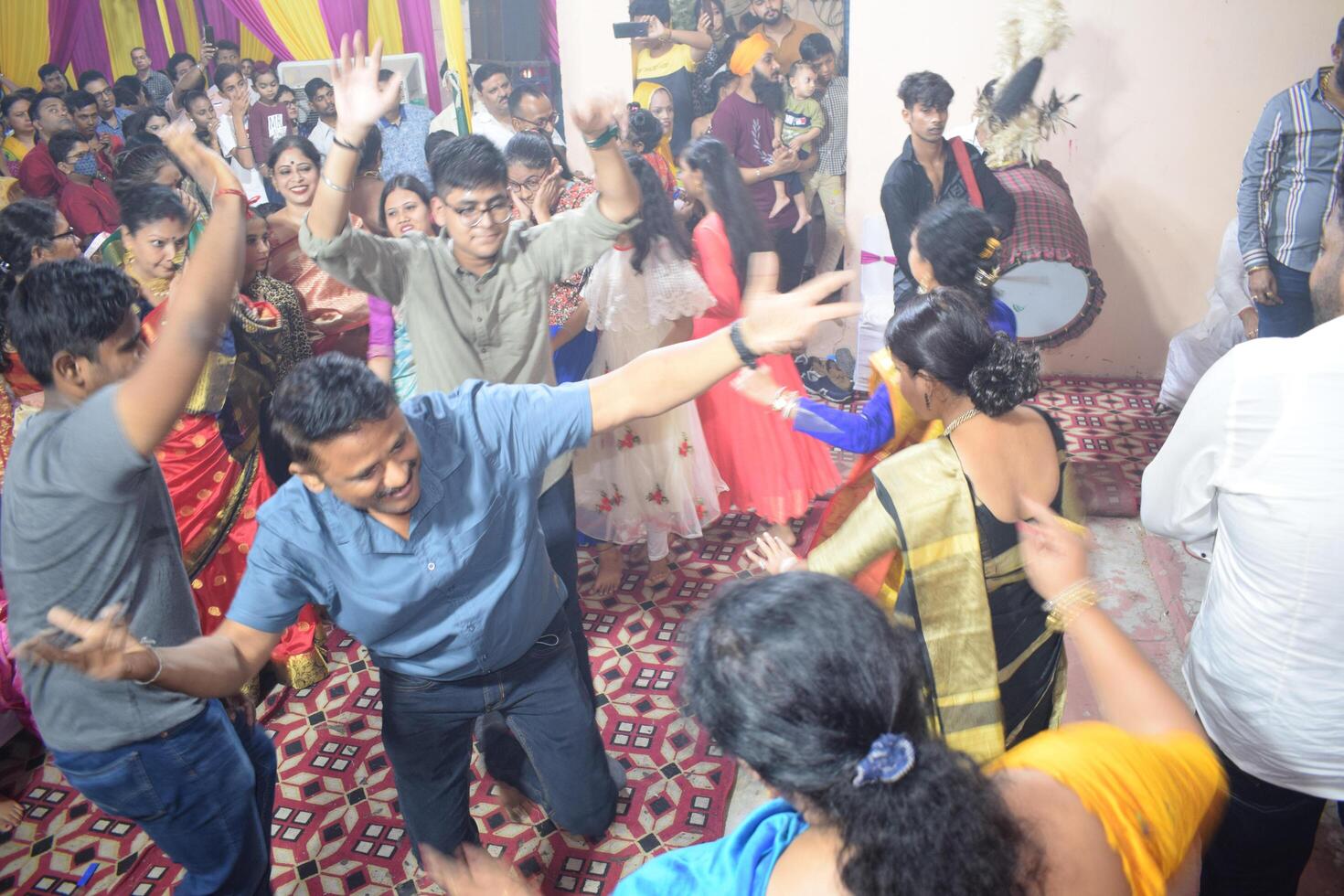 Delhi, India, July 02,2024 - Devotees performing spiritual dance in front of Durga Idol, Durga Puja celebration at Kali Bari temple in Jhilmil Colony Delhi, Durga utsav festival in Oct 2023 photo