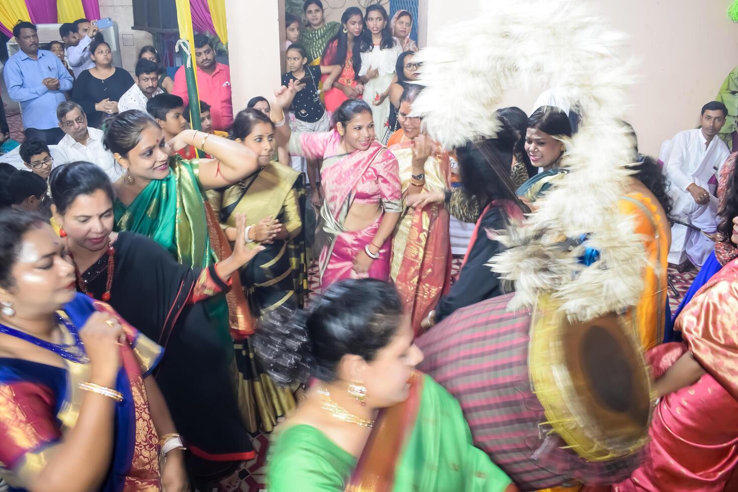 Delhi, India, July 02,2024 - Devotees performing spiritual dance in front of Durga Idol, Durga Puja celebration at Kali Bari temple in Jhilmil Colony Delhi, Durga utsav festival in Oct 2023 photo