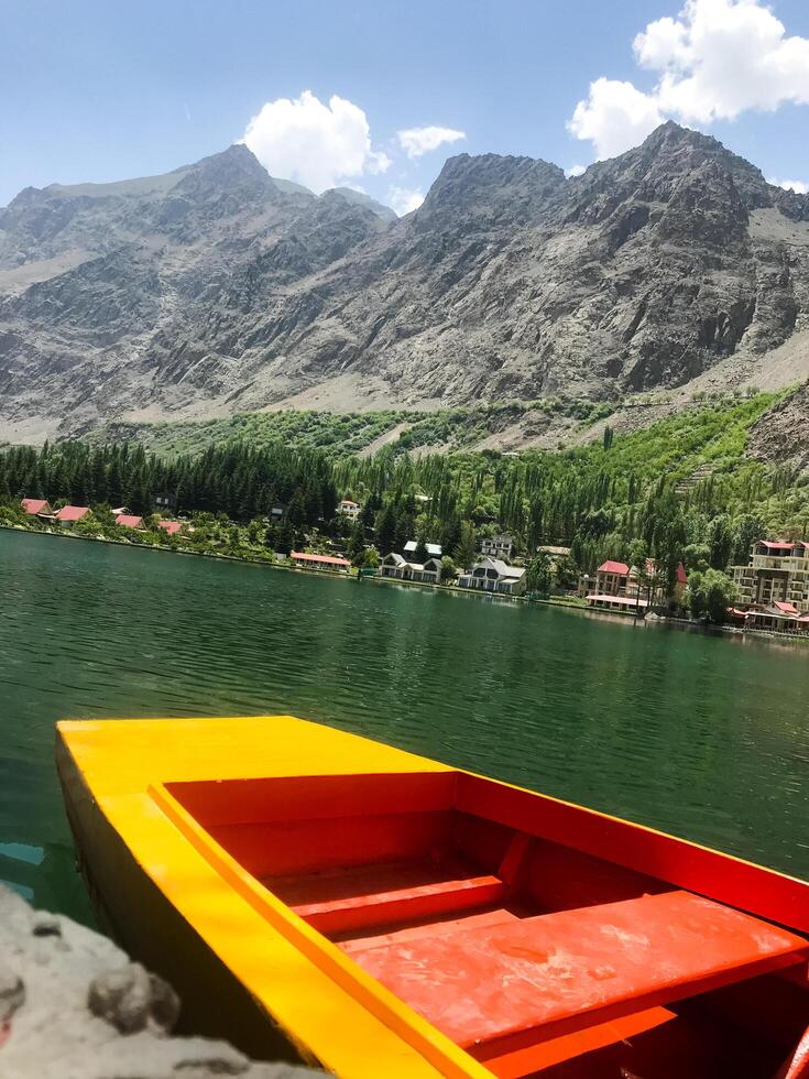 A view of Dal Lake in winter, and the beautiful mountain range in the background in the city of skardu , India. Suitable for banners, posts, social media, news, background. photo