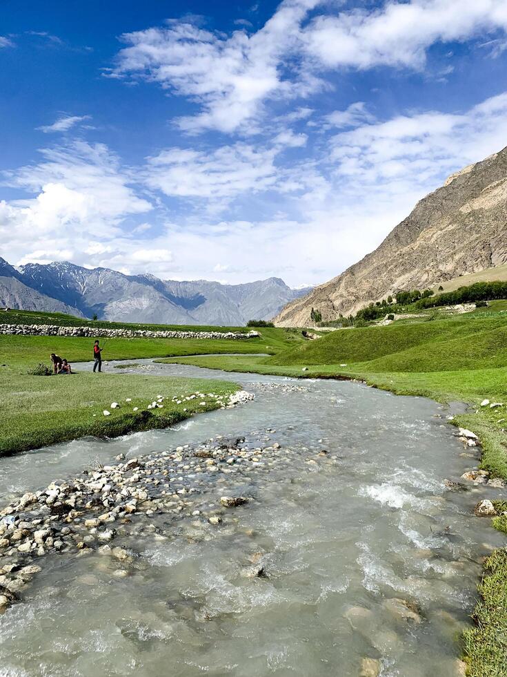 A view of Dal Lake in winter, and the beautiful mountain range in the background in the city of skardu , India. Suitable for banners, posts, social media, news, background. photo