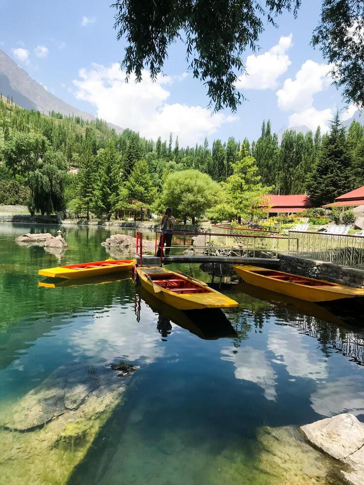 A view of Dal Lake in winter, and the beautiful mountain range in the background in the city of skardu , India. Suitable for banners, posts, social media, news, background. photo