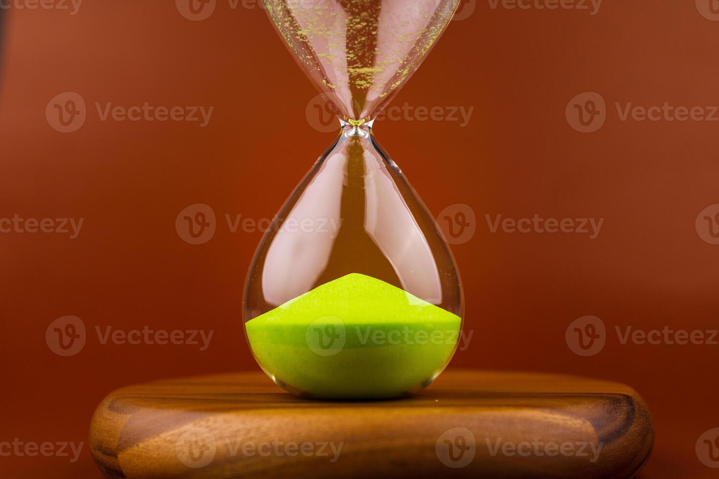 Hourglass with running out of time Concept of time and life Work with time as a deadline photo