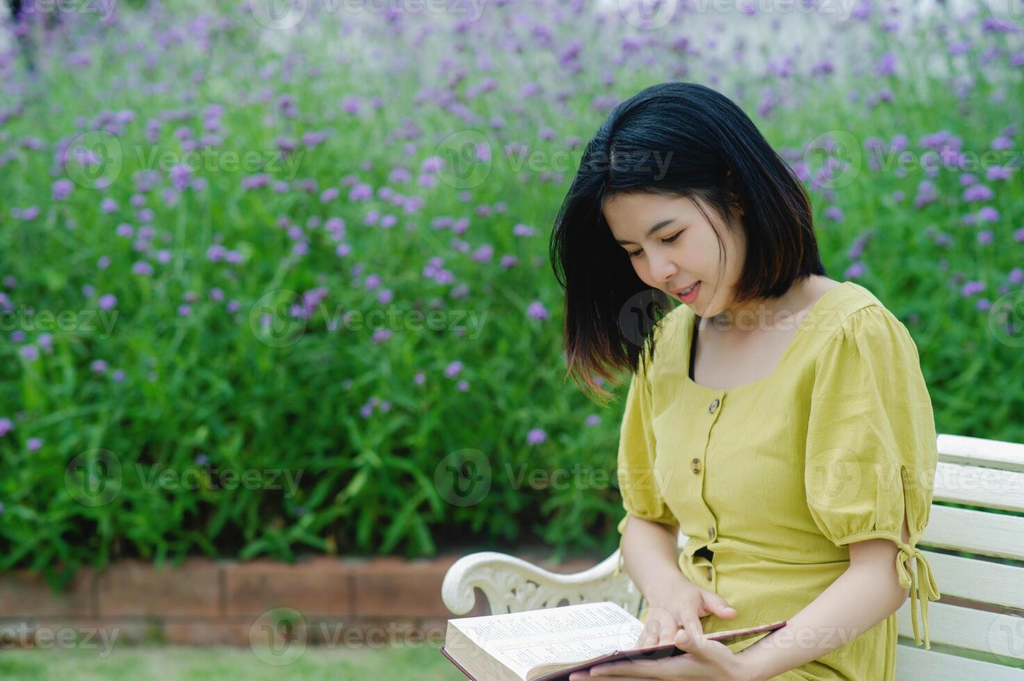 Reading books and smiling happily, brain food, learning and gaining knowledge from books in free time. photo