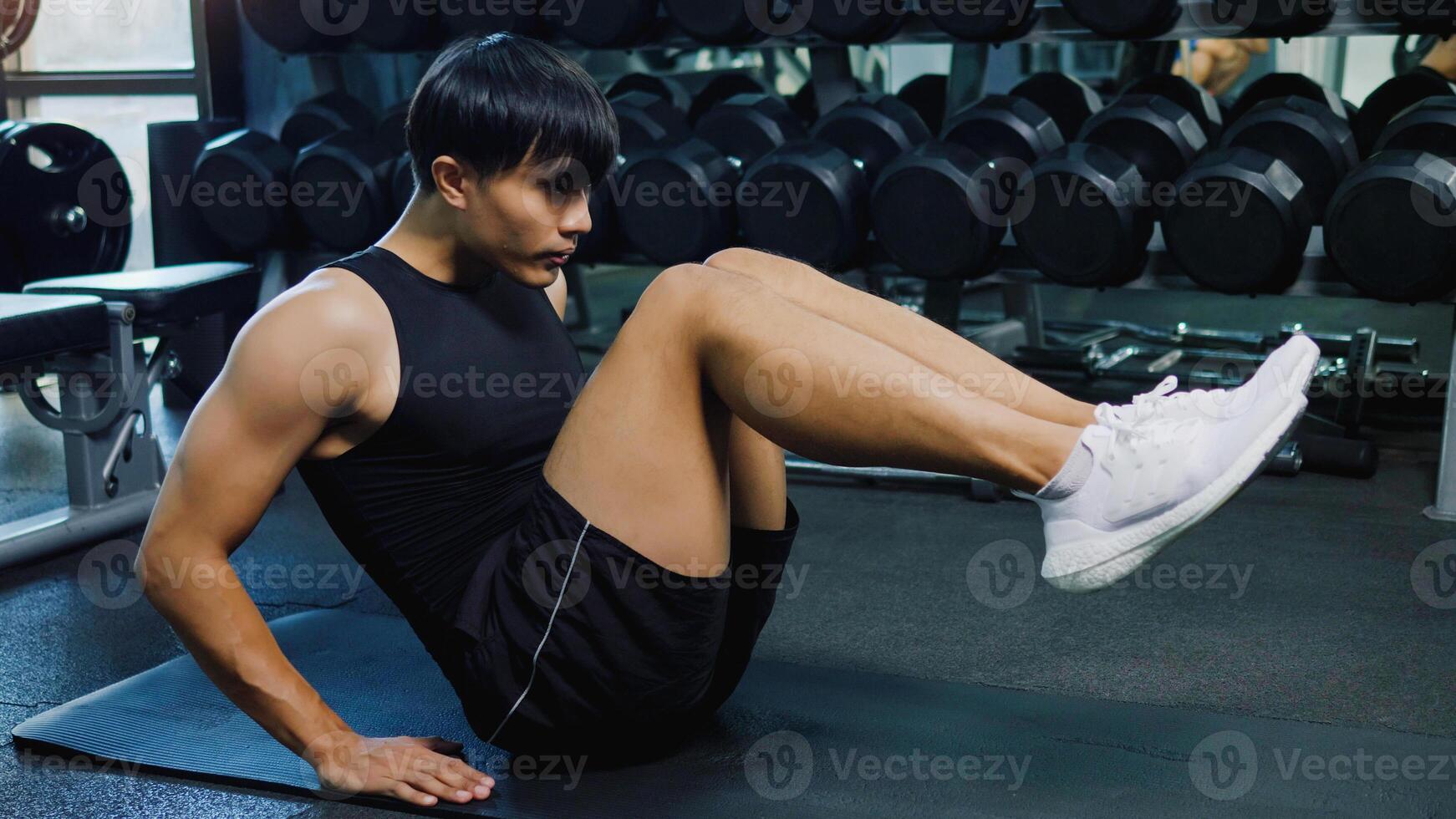 Exercise in the gym and build muscle for a healthy body. Bodybuilder health activities photo