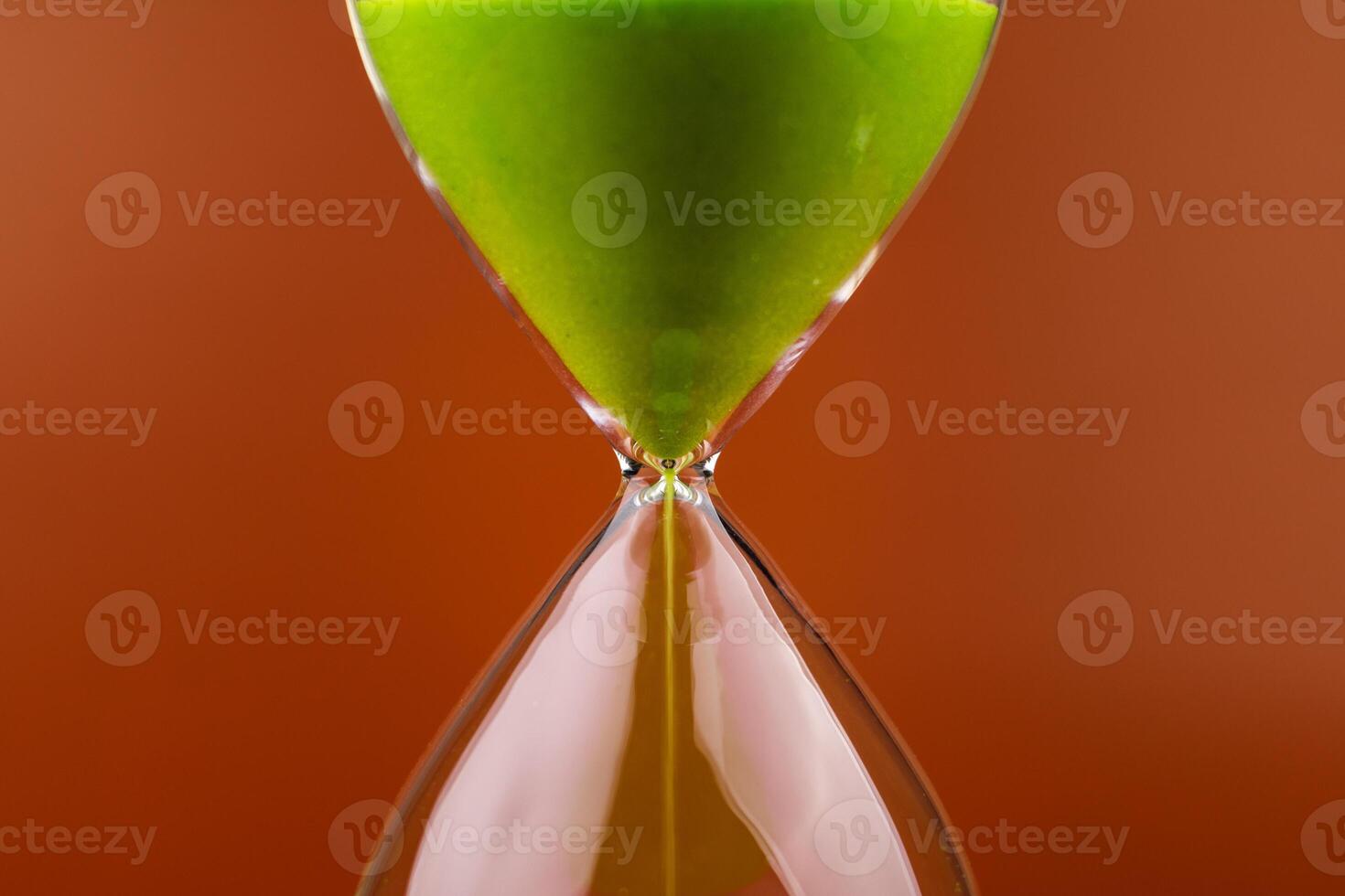 Hourglass with running out of time Concept of time and life Work with time as a deadline photo