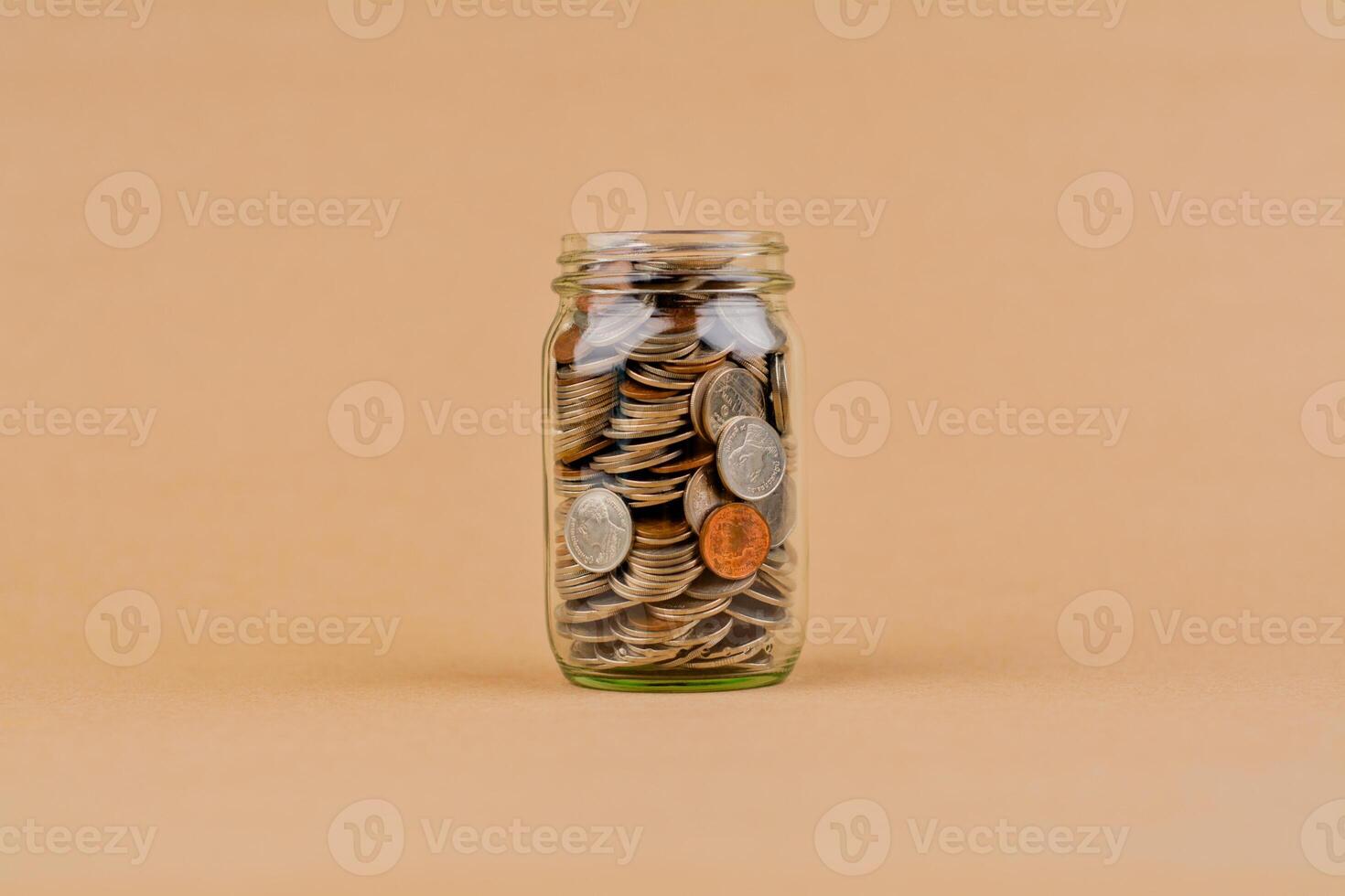Saving Coins in Glass Bottle Financial Plan and Investment, Creating Financial Security and Asset Growth photo