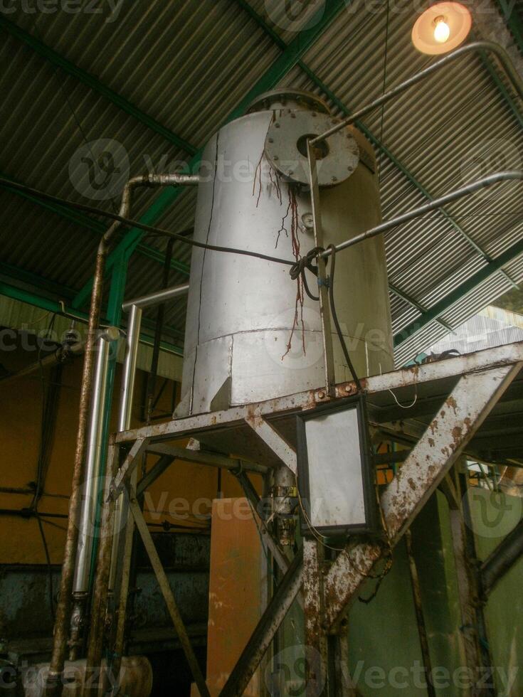 A large industrial machine in a warehouse photo