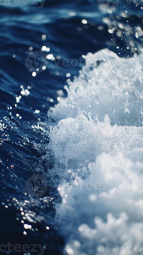 A close up of a wave in the ocean photo