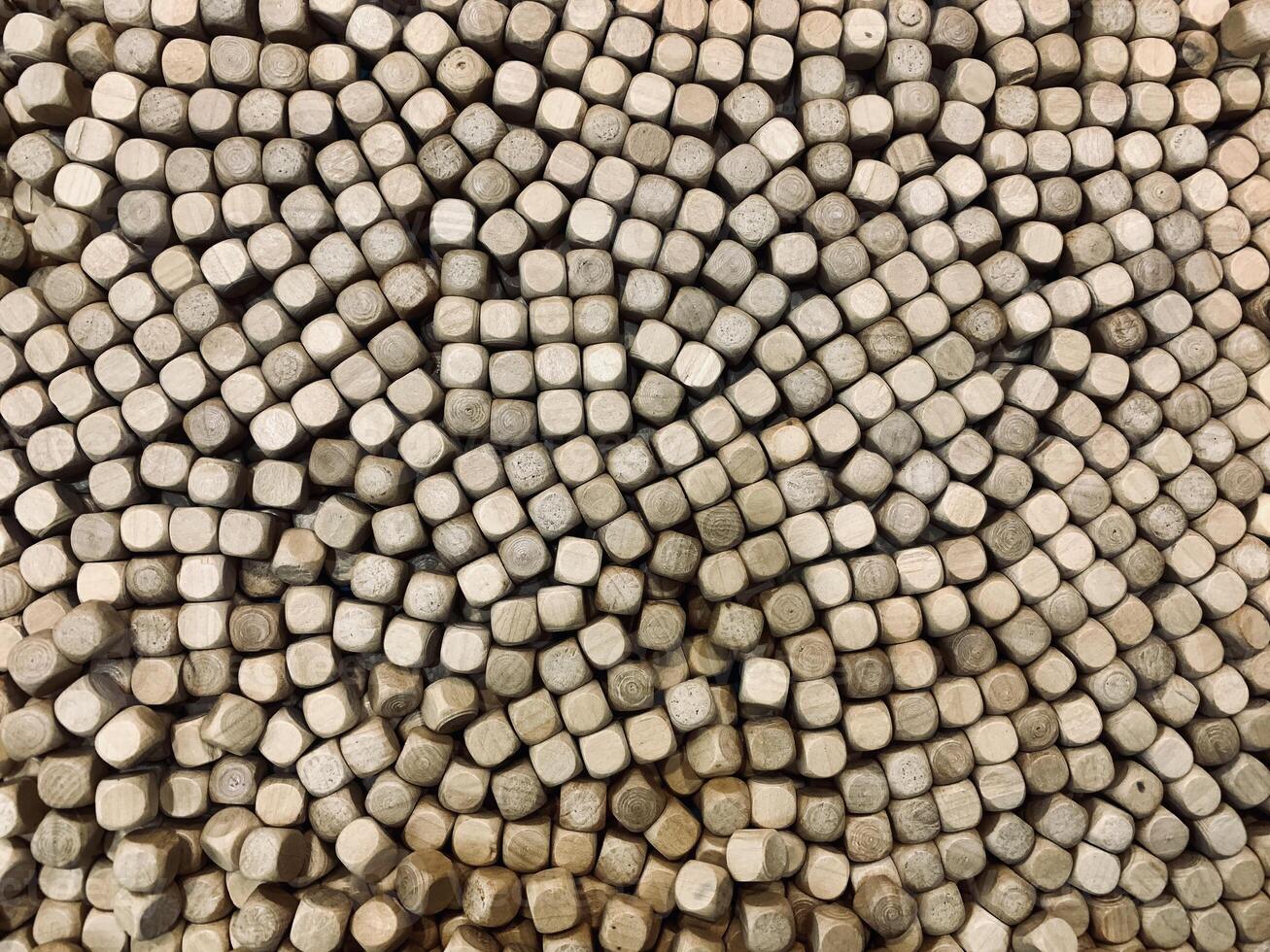 A close-up view of a collection of small round pieces of wood for children's toys. suitable for background photo