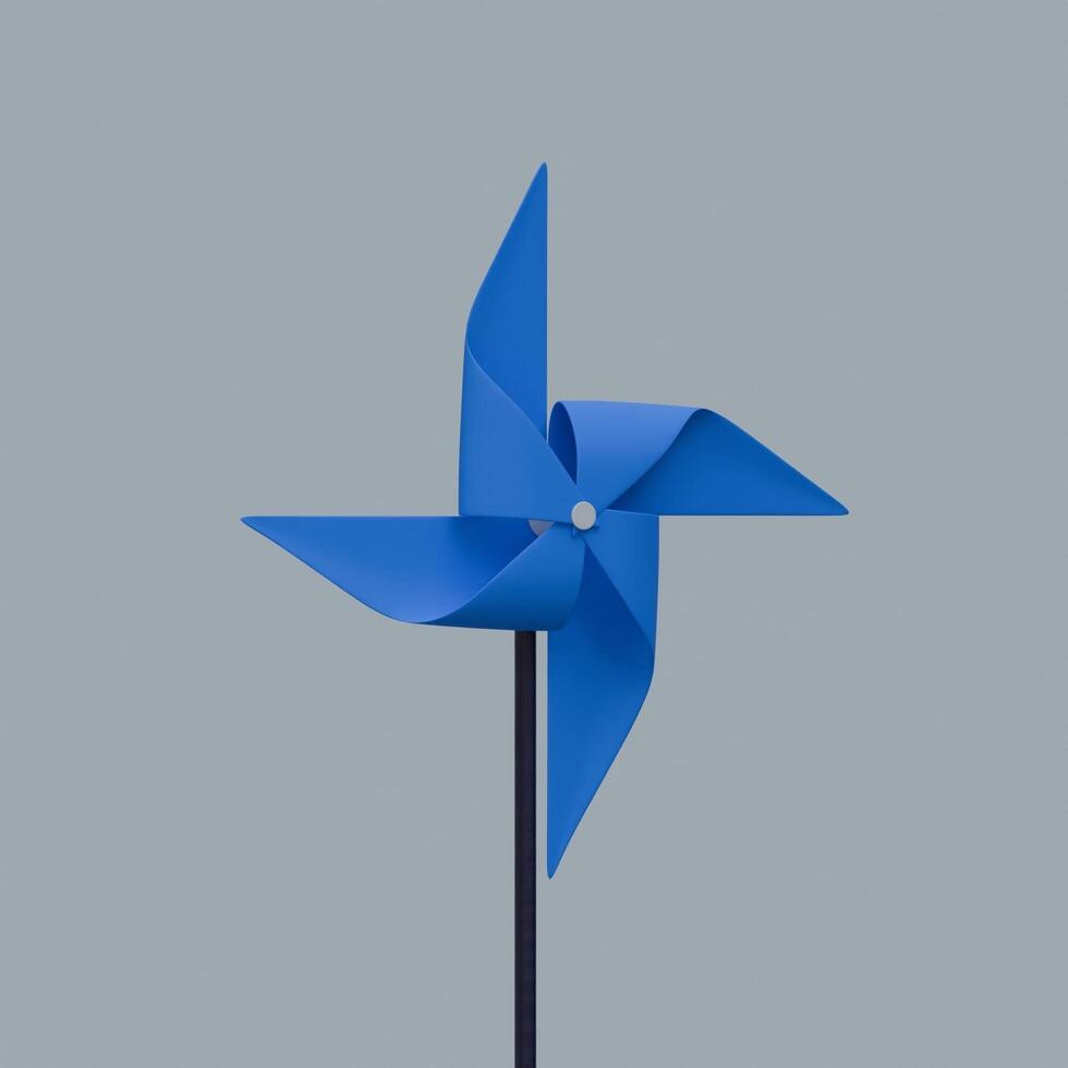 A blue windmill on a stick against a gray background photo