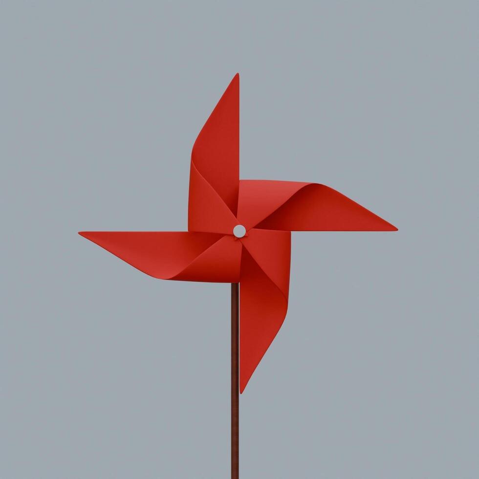 A red pinwheel on a stick against a gray background photo