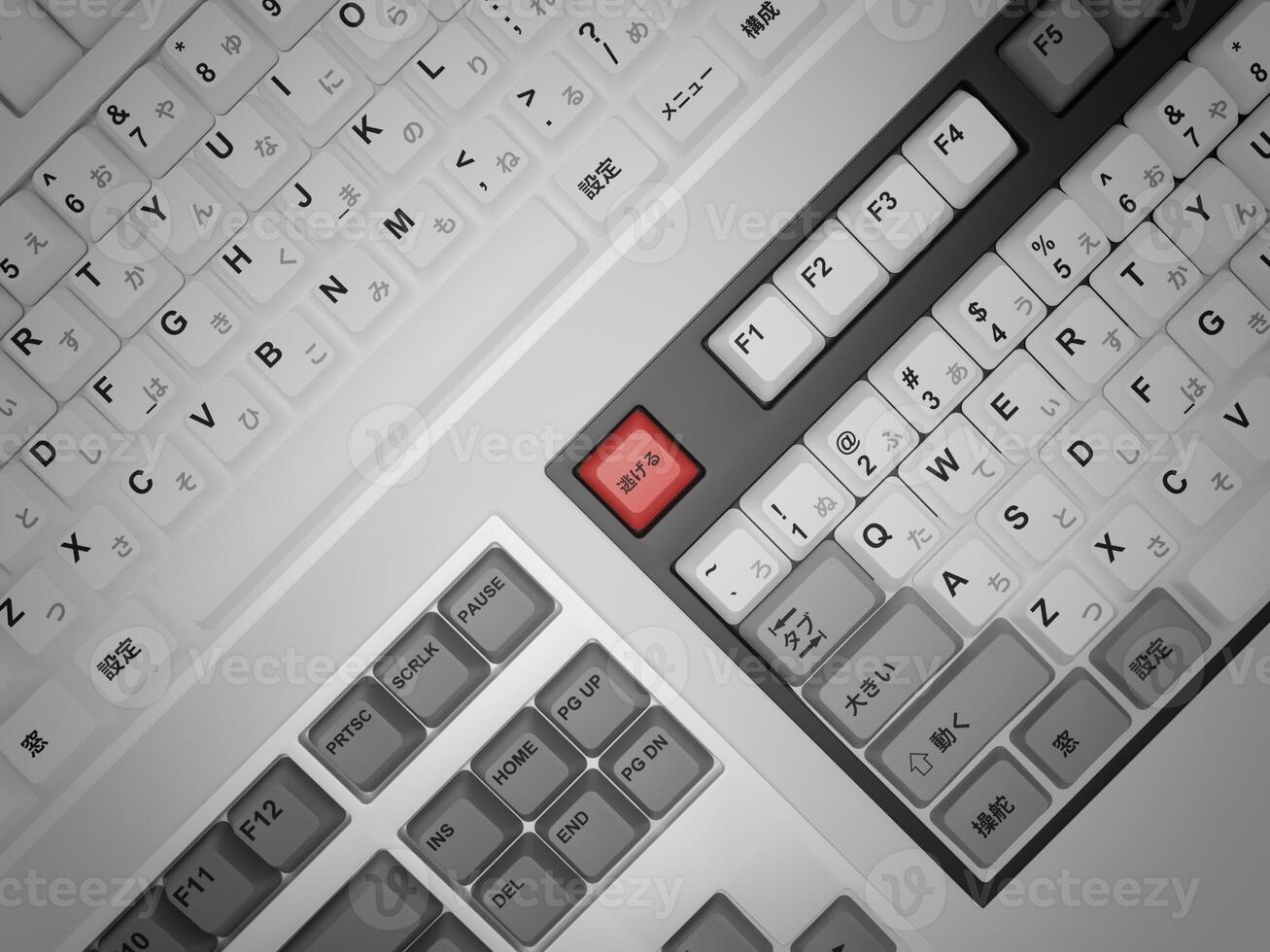 A keyboard with a red key on it photo