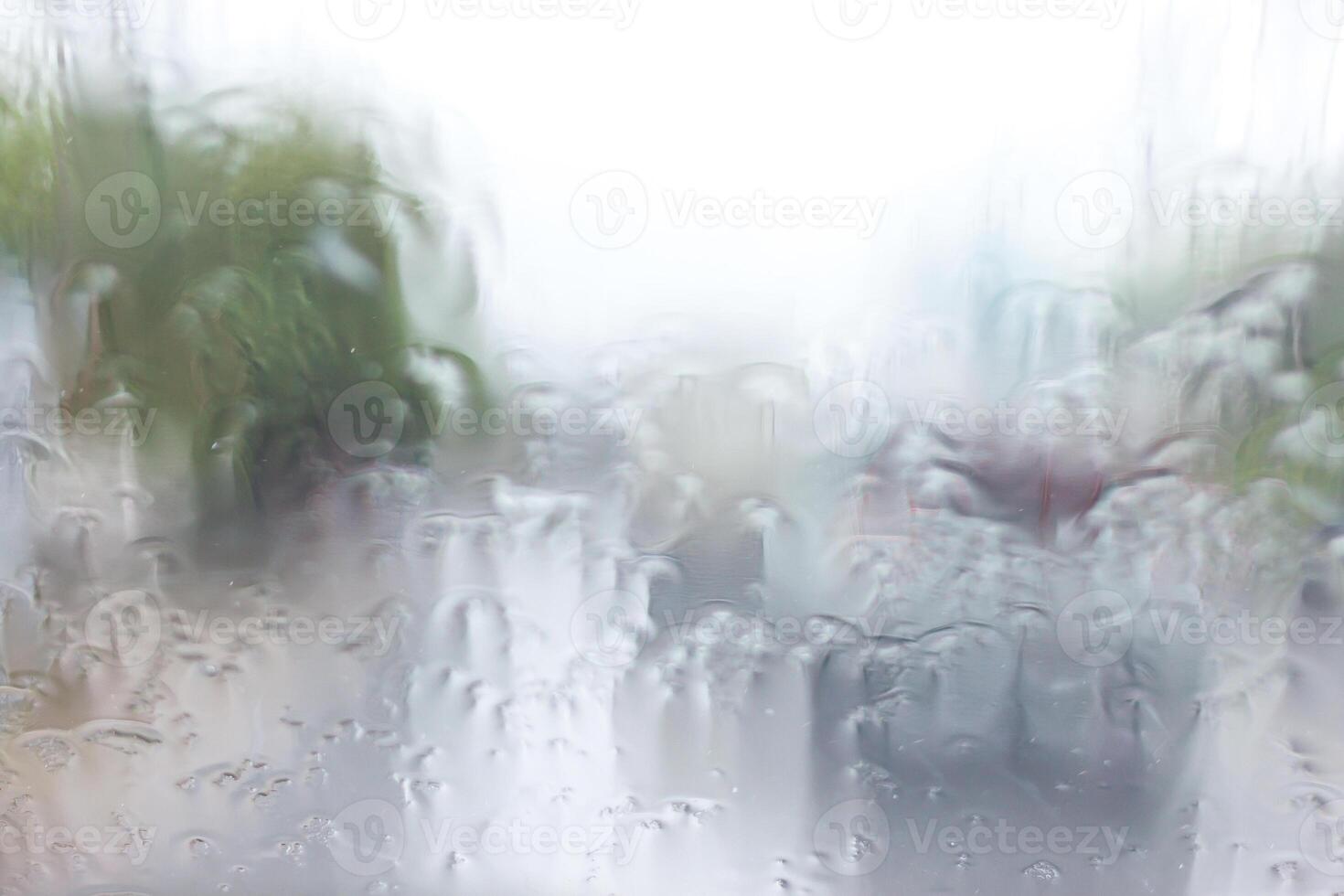 abstract texture of water falling on the glass photo