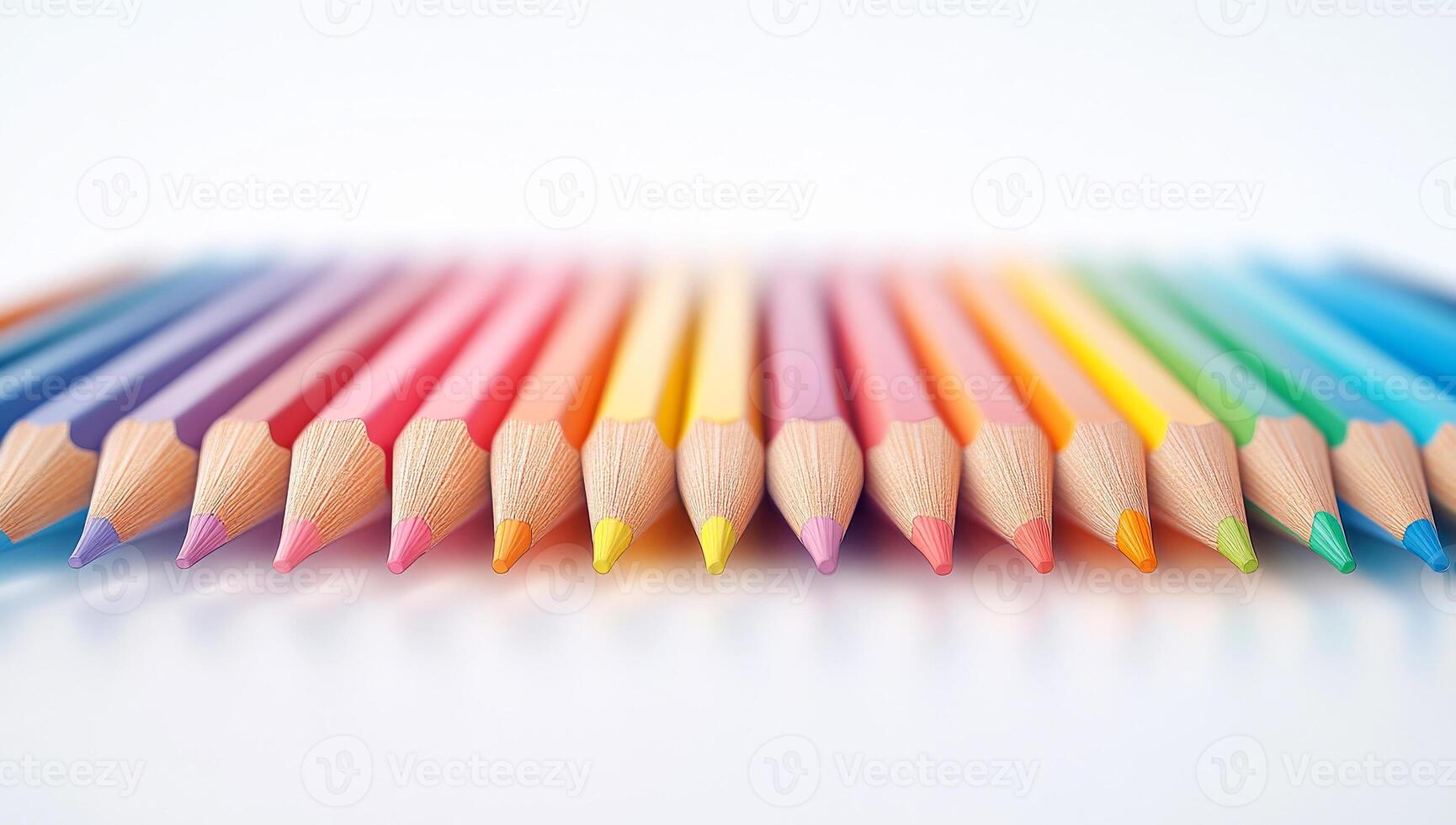 A vibrant array of colored pencils displays a spectrum of hues, neatly aligned for art and creativity, perfect for artists of all ages. photo