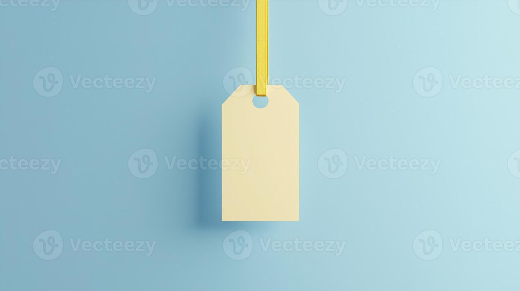 Paper price tag label white brand name with rope on solid blue background photo