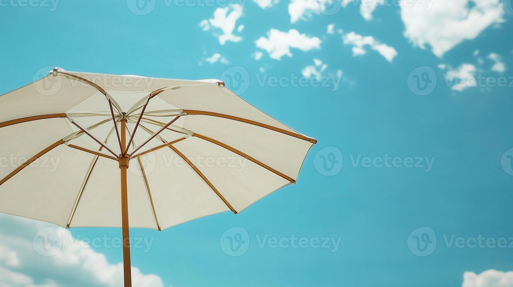Umbrella beach white with blue sky for sun protection in holiday trip photo