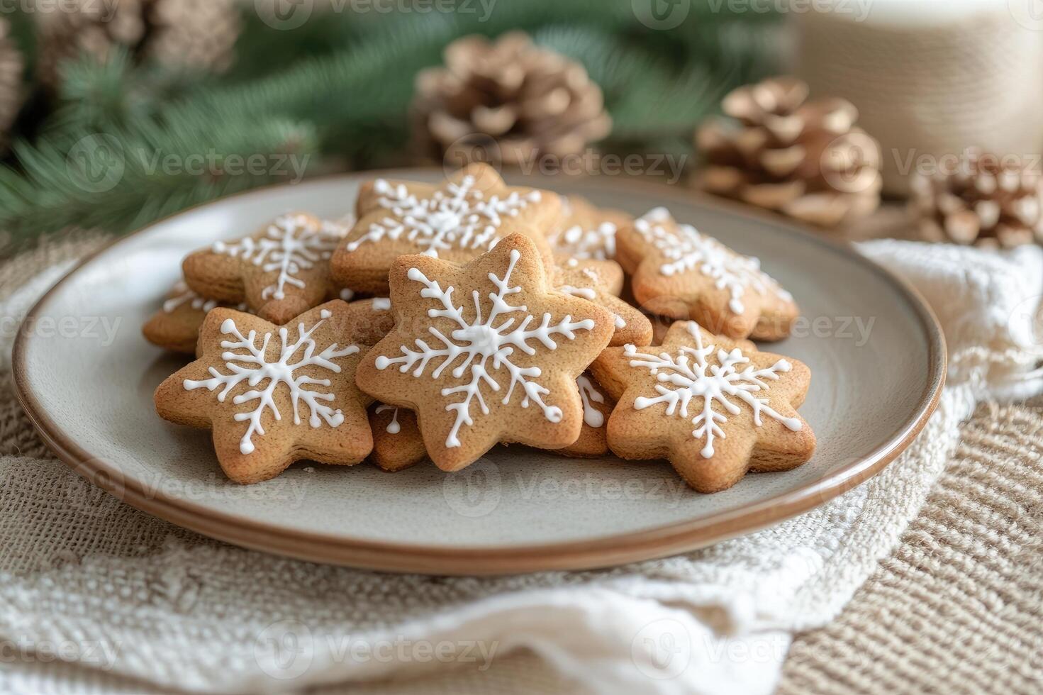 Plate of gingerbread star cookies with royal icing decoration for christmas photo