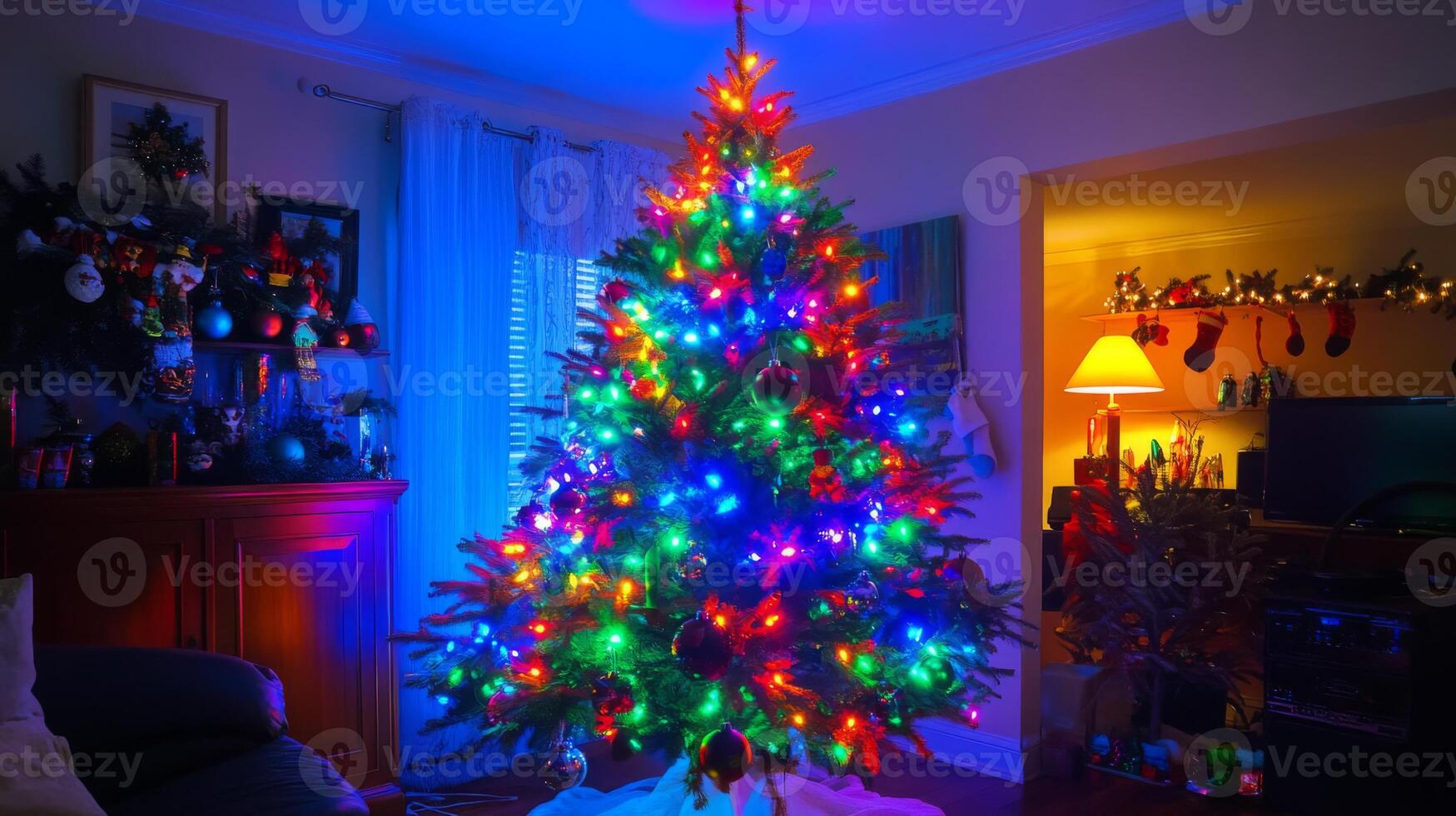 A Decorated Christmas Tree Illuminated with Colorful Lights in a Living Room photo