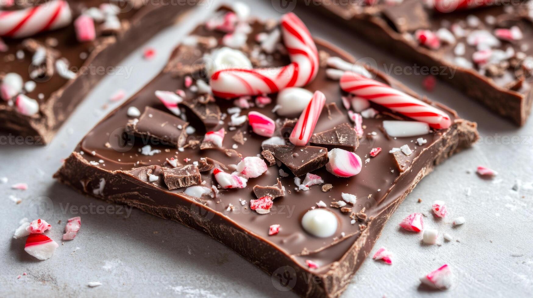 Closeup of Peppermint Bark with Candy Canes and Chocolate Chips photo