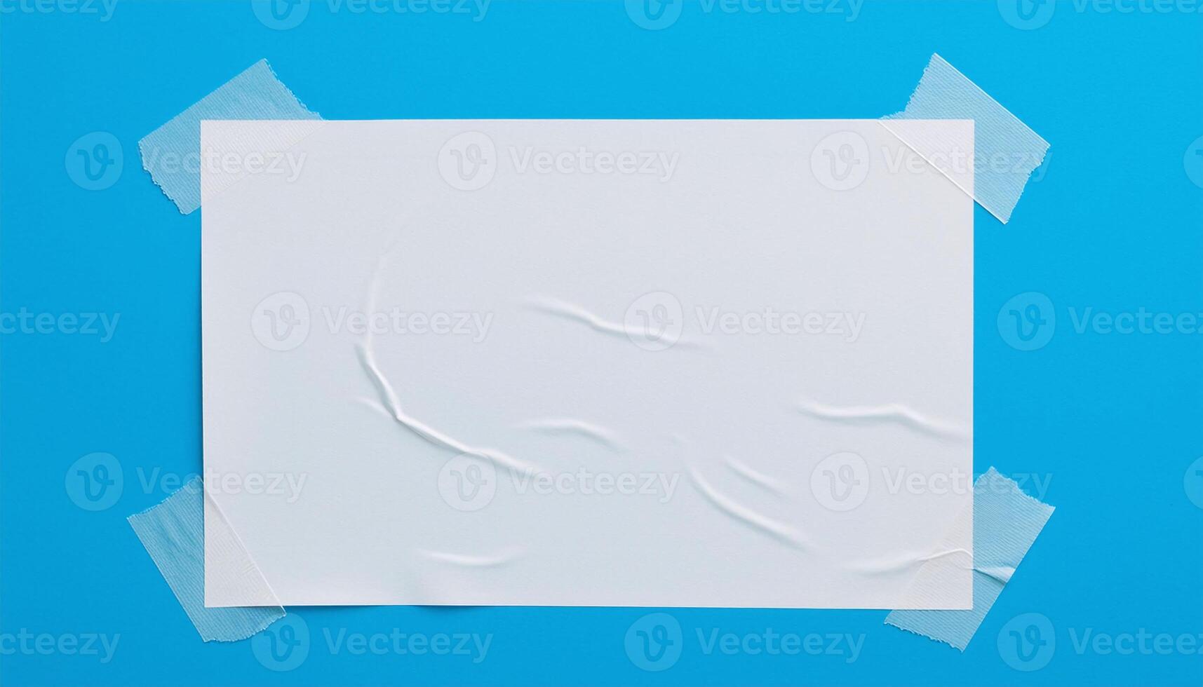 Blank Poster Paper on Blue Background photo