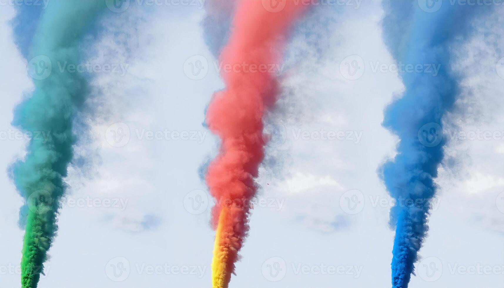 colorful airplane trail streaks across a clear sky photo