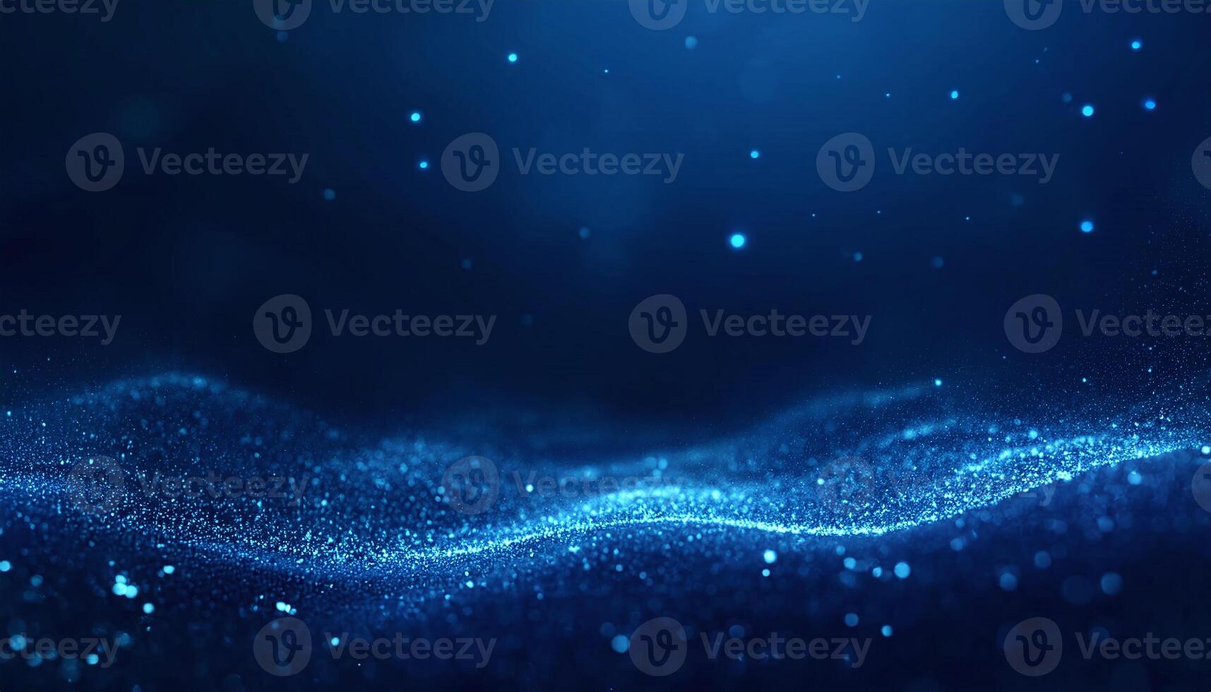 Dynamic Blue Particles Floating and Glowing Against a Dark Background photo