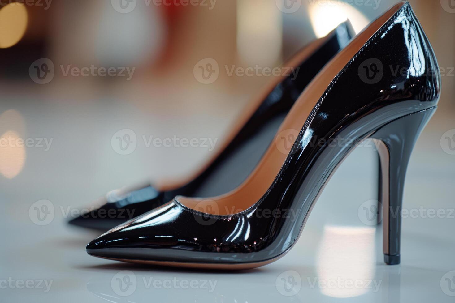 Elegant black patent leather high heel shoe. Glossy finish for formal wear photo