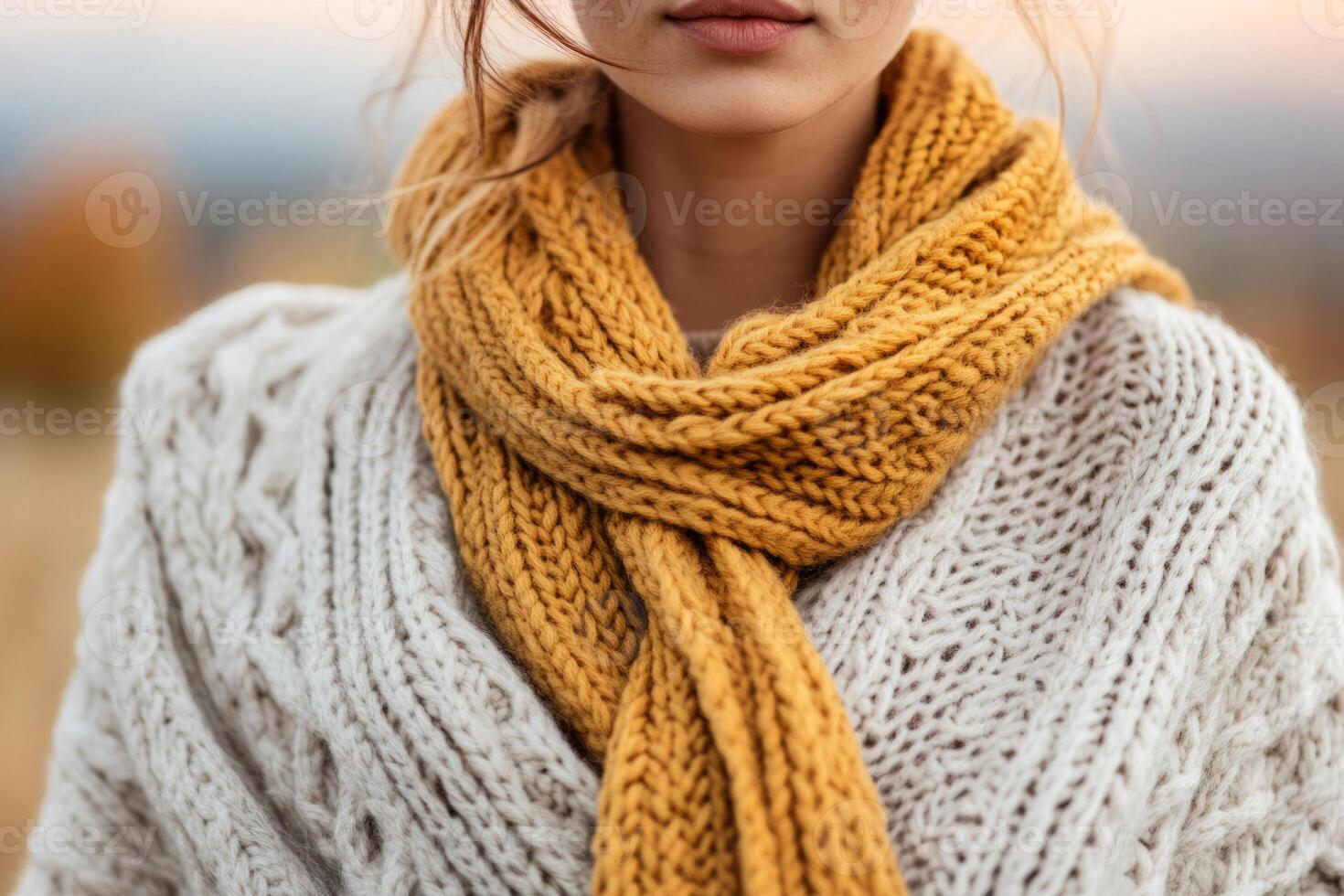 Fall outfit featuring a knit scarf and cream sweater photo