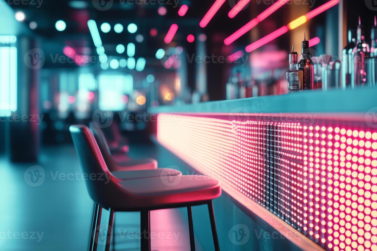 Modern bar with illuminated neon lighting, empty stools and a stylish counter photo
