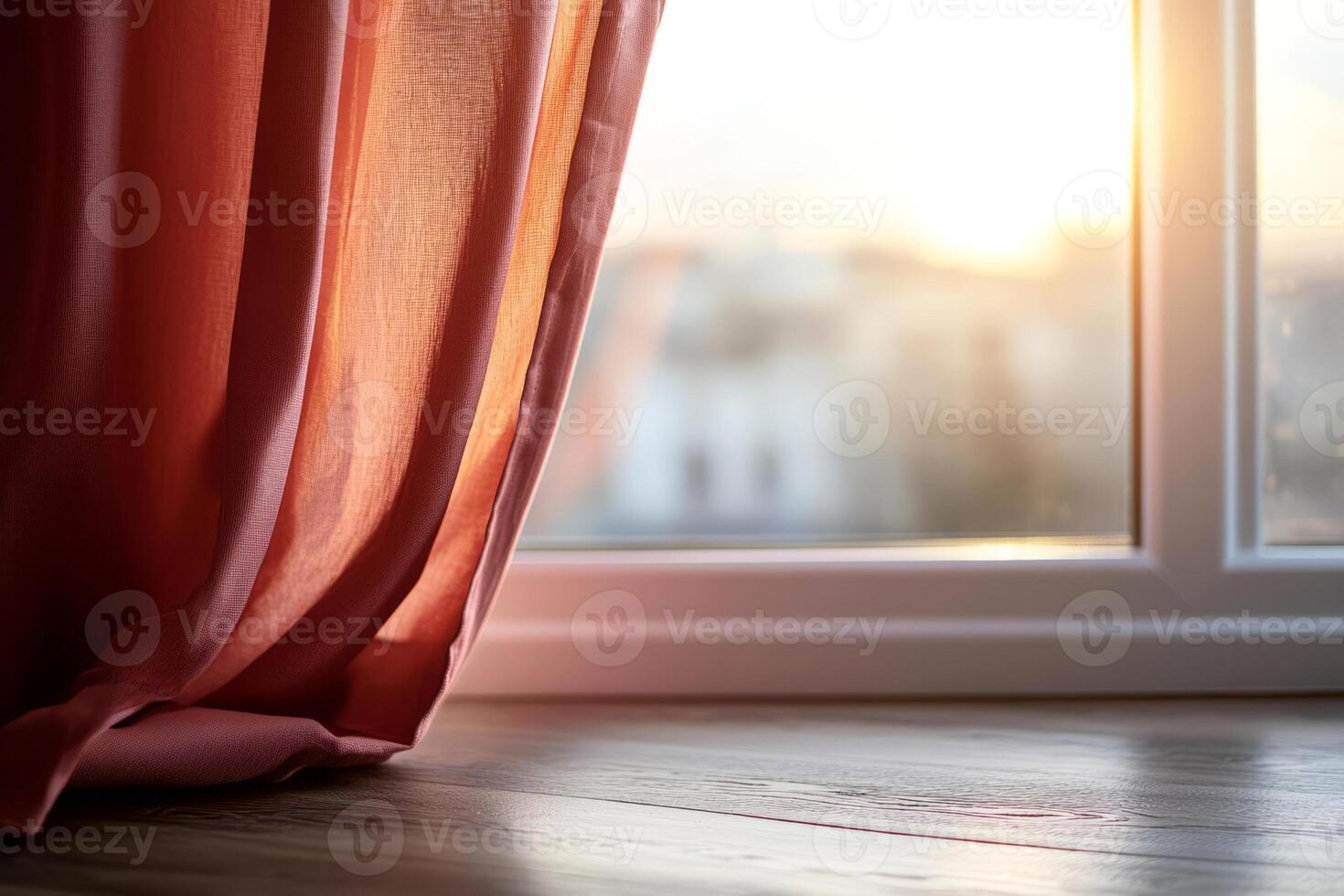 Sunlit room featuring soft curtains by a window photo