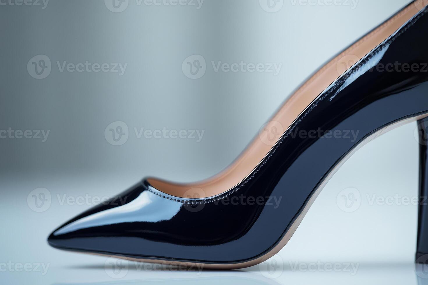 Elegant black patent leather high heel shoe. Glossy finish for formal wear photo