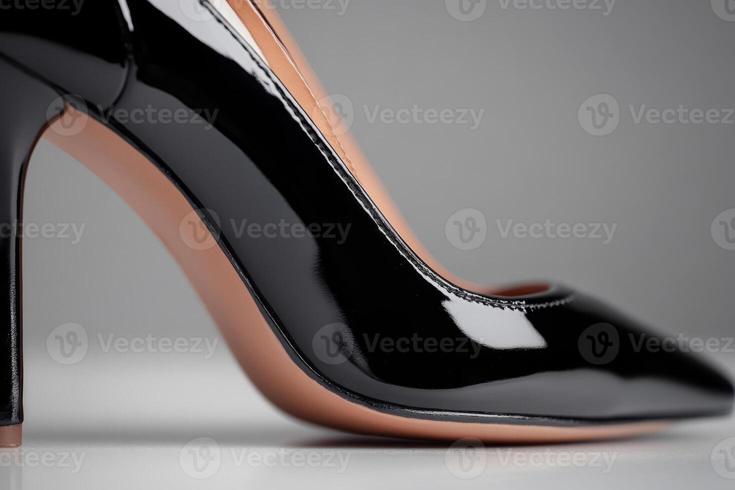 Elegant black patent leather high heel shoe. Glossy finish for formal wear photo