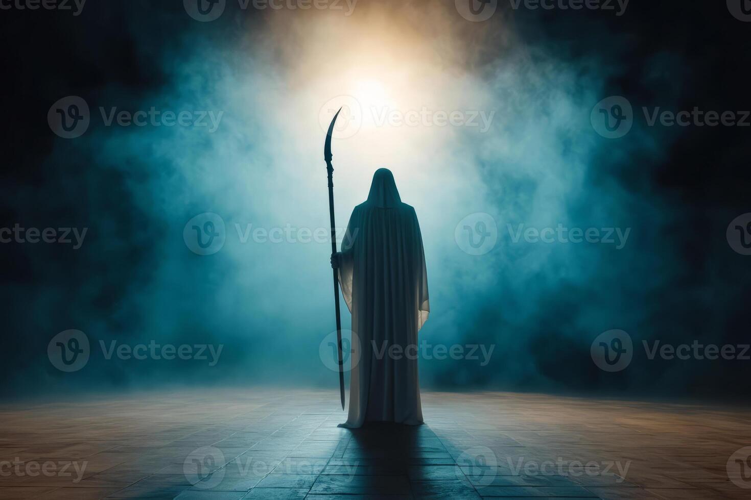 Dark hooded death figure holding a scythe stands in a thick fog photo